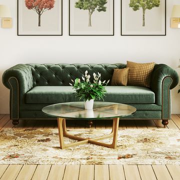 green chesterfield sofa in comfortable living room